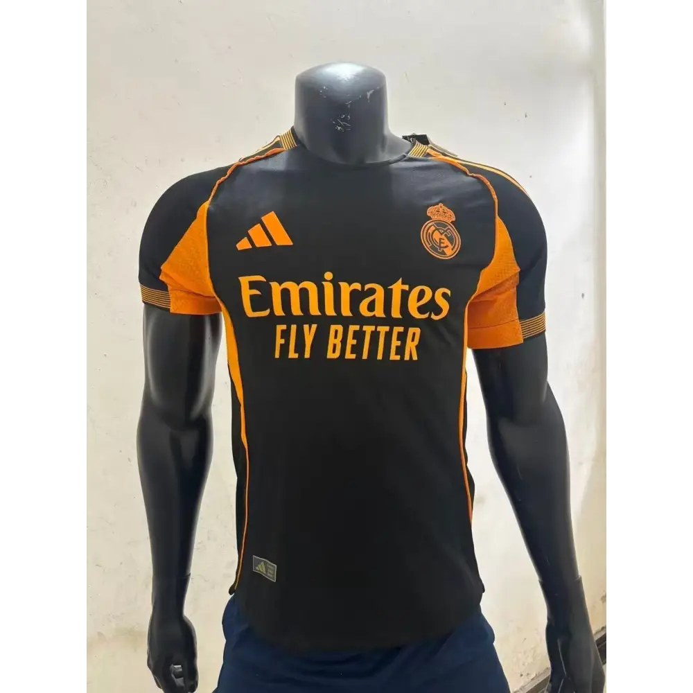 Maillot Real Madrid Noir & Orange 2025/2026 - Vêtements de sport